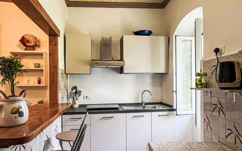 Enrico: Furniture, Kitchen, Interior Design, Kitchen Appliance, Countertop, Major Appliance, Flooring, Wood, Ceiling, Cabinetry