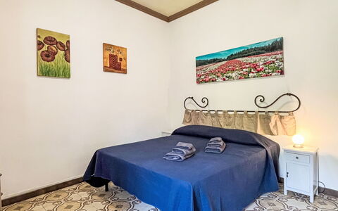 Enrico: Floor, Flooring, Interior Design, Room, Bedroom, Bed, Picture Frame, Wood Stain, Linens, Bed Sheet