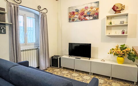 Enrico: Interior Design, Furniture, Flooring, Wall, Floor, Wood, Room, Lighting, Couch, Living Room