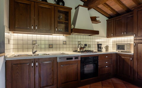 Villa Daluma, Private Pool in Todi: Kitchen, Cabinetry, Wood, Countertop, Major Appliance, Interior Design, Kitchen Appliance, Kitchen Stove, Furniture, Ceiling