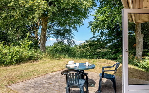Aagot - 250M from the Sea: Furniture, Interior Design, Chair, Outdoor Furniture, Natural Material, Shade, Outdoor Table, Design, Restaurant, Kitchen & Dining Room Table