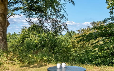 Aagot - 250M from the Sea: Furniture, Interior Design, Chair, Outdoor Furniture, Natural Material, Shade, Outdoor Table, Design, Restaurant, Kitchen & Dining Room Table