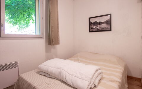 Les Chalets D'Ax: Bed, Bedroom, Bedding, Bed Sheet, Wall, Interior Design, Wood, Furniture, Floor, Room