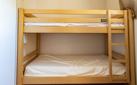 Les Chalets D'Ax: Wood, Floor, Bedroom, Flooring, Bed, Bunk Bed, Bedding, Wood Stain, Bed Frame, Bed Sheet