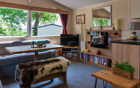 Seascape: Wood, Furniture, Interior Design, Flooring, Couch, Ceiling, Floor, Living Room, Room