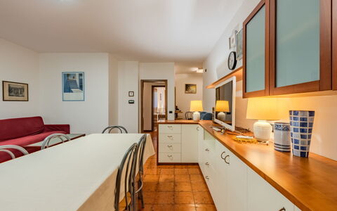 Locanda dei Nonni: Flooring, Interior Design, Furniture, Kitchen, Wood, Floor, Ceiling, Countertop, Kitchen & Dining Room Table, Room