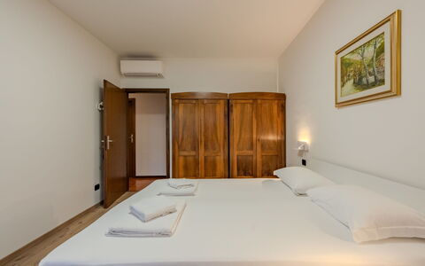Locanda dei Nonni: Apartment, Ceiling, Bed Frame, Bed, Bedroom, Hotel, Wood Stain, Bedding, Suite, Hardwood