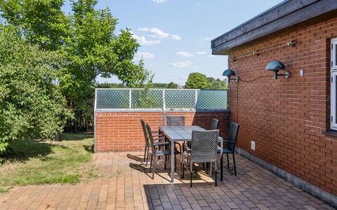 Helge - 10Km from the Sea: Brick, Furniture, Outdoor Furniture, Brickwork, Garden, Outdoor Table, Wood Stain, Chair, Patio, Backyard