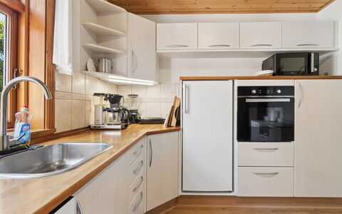 Helge - 10Km from the Sea: Kitchen, Kitchen Appliance, Countertop, Flooring, Major Appliance, Cabinetry, Interior Design, Wood, Furniture, Floor