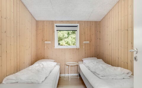 Nakke - 900M from the Sea: Wood, Bedroom, Ceiling, Bed, Bedding, Plank, Bed Sheet, Hardwood, Wood Stain, Daylighting
