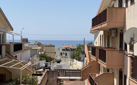 Villa Magda: Building, Residential Area, Town, Urban Area, Home, Neighbourhood, Apartment, Roof, Architecture, House