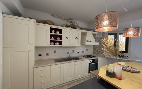 Villa Magda: Furniture, Interior Design, Kitchen, Countertop, Flooring, Light Fixture, Wood, Ceiling, Cabinetry, Floor