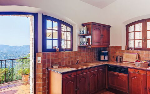 Balcon D'Azur: Wood, Kitchen, Furniture, Cabinetry, Flooring, Countertop, Interior Design, Kitchen Appliance, Floor, Wood Stain