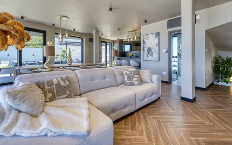 Black Imperium: Furniture, Interior Design, Flooring, Couch, Floor, Ceiling, Wood, Living Room, Wood Flooring, Room