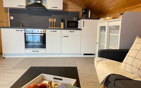 Allalinblick: Wood, Furniture, Flooring, Interior Design, Floor, Cabinetry, Room, Ceiling, Apartment, Kitchen