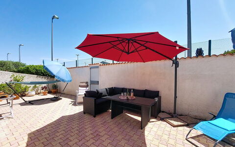 L Escapade Orangeoise: Furniture, Outdoor Furniture, Umbrella, Chair, Outdoor Table, Shade, Swimming Pool, Resort, Patio, Flowerpot