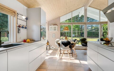 Marjanna - 700M to the Fjord: Flooring, Ceiling, Interior Design, Floor, Kitchen, Home, Countertop, Chair, Light Fixture, Wood Flooring