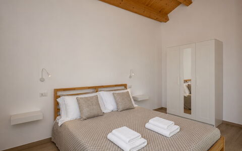 Villa Blue: Interior Design, Flooring, Furniture, Bed, Floor, Wood, Bedroom, Ceiling, Room, Bedding