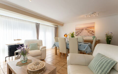 Centrally Located Sea You Again: Furniture, Interior Design, Flooring, Couch, Floor, Wood, Ceiling, Living Room, Room, Table