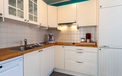 Centrally Located Sea You Again: Cabinetry, Kitchen, Kitchen Appliance, Countertop, Major Appliance, Interior Design, Wood, Flooring, Cupboard, Kitchen Sink