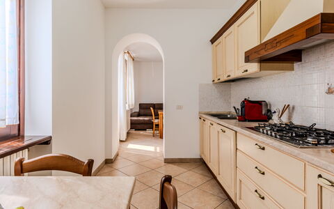 Casa Iolanda: Interior Design, Flooring, Wood, Floor, Kitchen, Countertop, Room, Cabinetry, Ceiling, Furniture