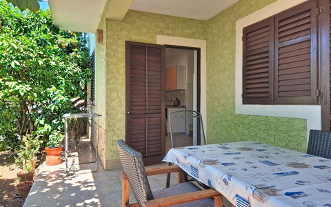 Robi 1: Furniture, Interior Design, Flooring, Floor, Table, Wood, Ceiling, Chair, Room, Couch
