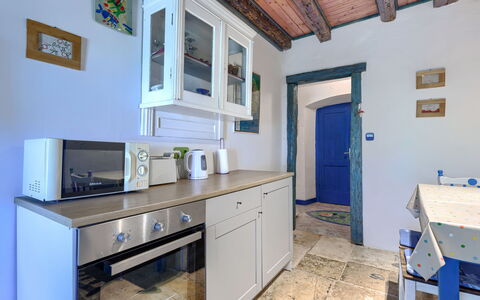 Nina: Furniture, Kitchen, Countertop, Cabinetry, Interior Design, Kitchen Appliance, Flooring, Ceiling, Major Appliance, Floor