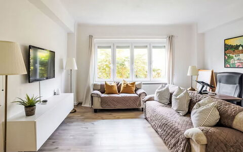 Prague Castle Oasis: Furniture, Interior Design, Couch, Flooring, Wall, Floor, Room, Living Room, Wood, Ceiling