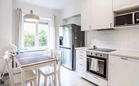 Prague Castle Oasis: Furniture, Interior Design, Kitchen, Flooring, Kitchen Appliance, Wood, Cabinetry, Major Appliance, Countertop, Floor