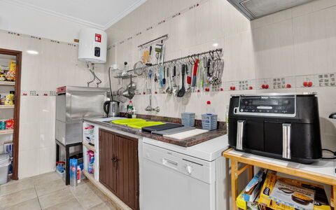 La Buena Vida: Kitchen, Major Appliance, Kitchen Appliance, Flooring, Interior Design, Countertop, Floor, Lighting, Home Appliance, Room