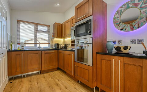 Loch Ness View (Lodge 11): Furniture, Interior Design, Apartment, Floor, Flooring, Table, Chair, Living Room, Room, Home
