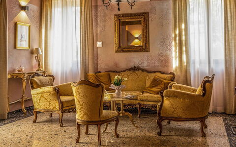 Relais Villa Mirandola: Furniture, Interior Design, Couch, Wall, Flooring, Floor, Living Room, Room, Chair, Lighting