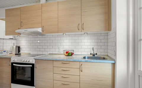 Ineke - 200M from the Sea: Countertop, Cabinetry, Kitchen, Flooring, Kitchen Appliance, Furniture, Major Appliance, Wood, Sink, Interior Design