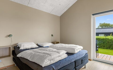 Illona - 200M from the Sea: Flooring, Wood, Floor, Ceiling, Interior Design, Bedroom, Furniture, Room, Bed, Bed Frame