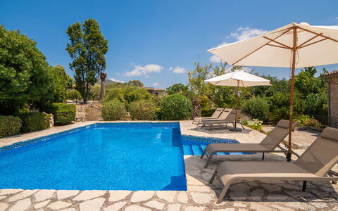 Can Toni: Blue, Swimming Pool, Water, Outdoor Furniture, Sunlounger, Resort, Flagstone, Composite Material, Shade, Landscaping