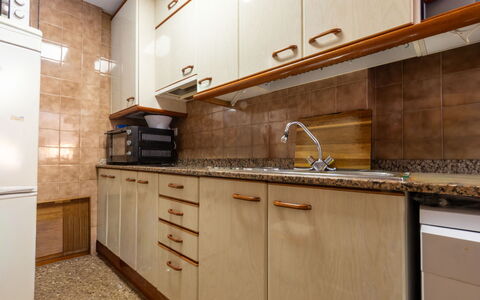 Faro Grande Salou: Kitchen, Countertop, Cabinetry, Kitchen Appliance, Major Appliance, Wood, Flooring, Sink, Kitchen Sink, Plumbing Fixture