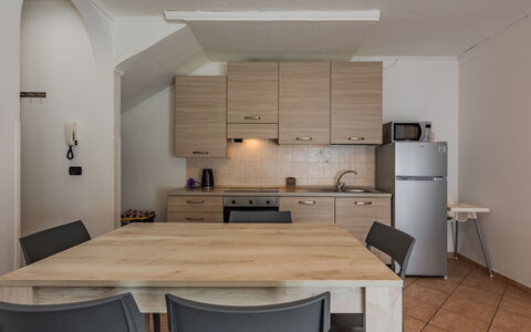 Stefani: Furniture, Interior Design, Flooring, Wood, Floor, Ceiling, Room, Kitchen, Kitchen & Dining Room Table, Countertop