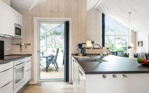 Merita - 600M from the Sea: Wood, Kitchen, Countertop, Ceiling, Plumbing Fixture, Wood Flooring, Hardwood, Kitchen Appliance, Chair, Plank