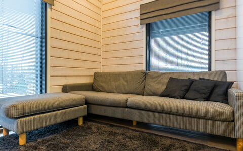 Golfarinkunnas 6A: Couch, Wood, Flooring, Furniture, Interior Design, Living Room, Textile, Floor, Brown, Apartment