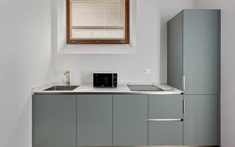 La Piazza Grand Vista Suite: Kitchen, Kitchen Appliance, Cabinetry, Countertop, Interior Design, Furniture, Flooring, Wood, Major Appliance, Home Appliance