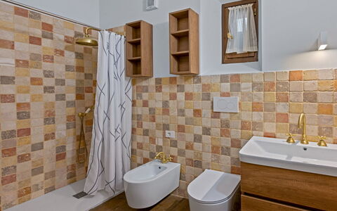 La Piazza Grand Vista Suite: Flooring, Wall, Plumbing Fixture, Floor, Bathroom, Toilet Seat, Interior Design, Toilet, Tile, Sink