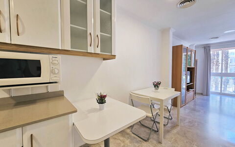 Apartamento Alba 1: Furniture, Interior Design, Flooring, Wood, Floor, Countertop, Kitchen, Room, Cabinetry, Ceiling