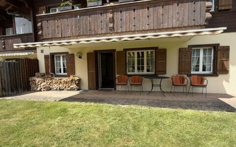 Lenk 755: Door, Cottage, Chair, Yard, Hardwood, Wood Stain, Houseplant, Backyard, Porch, Outdoor Furniture