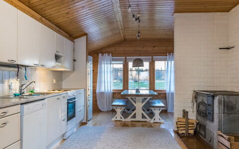 Villa Kettu: Wood, Ceiling, Interior Design, Furniture, Home, Kitchen, Room, Floor, Light Fixture, Countertop