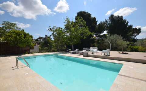 La Dimora di Diana: Swimming Pool, Shade, Composite Material, Outdoor Furniture, Resort, Concrete, Leisure, Water Feature, Landscaping, Flagstone