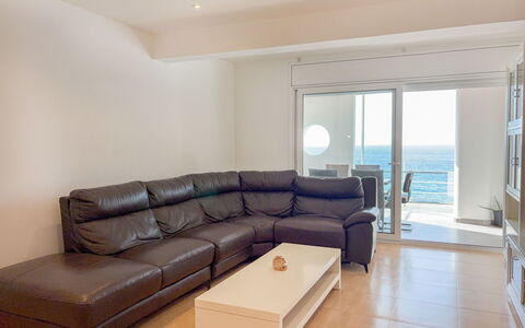 Clara: Furniture, Floor, Flooring, Couch, Interior Design, Living Room, Apartment, Room, Sea