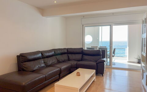 Clara: Furniture, Floor, Flooring, Couch, Interior Design, Living Room, Apartment, Room, Sea