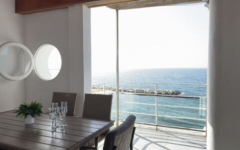 Clara: Furniture, Sea, Floor, Flooring, Table, Ocean, Chair, Glass, Shade, Coast