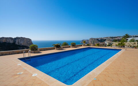 Pueblo de la Luz: Blue, Swimming Pool, Sea, Resort, Coast, Outdoor Furniture, Tropics, Resort Town, Hotel, Bay
