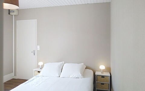 Riviera: Wall, Interior Design, Bedroom, Furniture, Floor, Wood, Flooring, Bed, Bedding, Textile